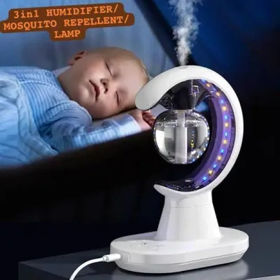 3 in 1 mosquito repellent humidifier lamp plugged into power beside a sleeping baby in bed
