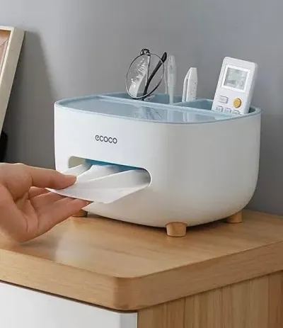 Three color options for the Ecoco Tissue Box organizer in gray, blue, and pink displayed on white stands.