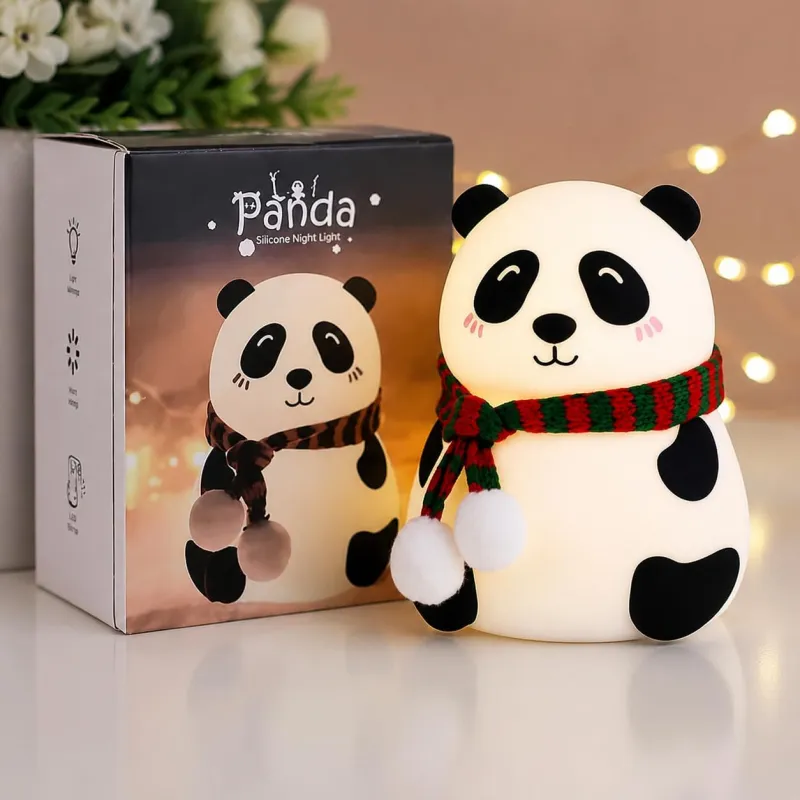 Panda Silicone Night Light glowing white next to its dark packaging box with scarf detail.