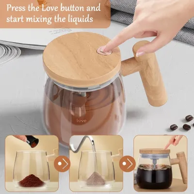 Self stirring glass mug being operated by a finger pressing the lid button to mix coffee inside