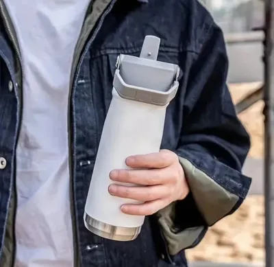 Sipper Bottle with Hanging Strap – shown in use