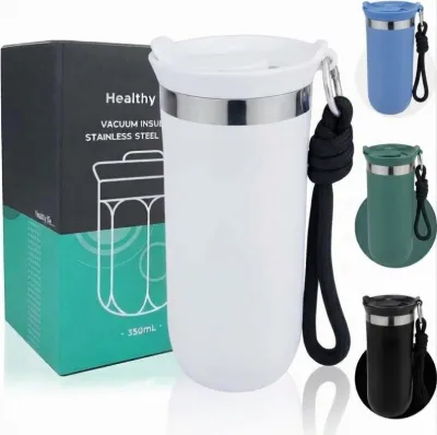 White Vacuum Insulated Coffee Mug 350ml with black rope attached next to green product packaging.